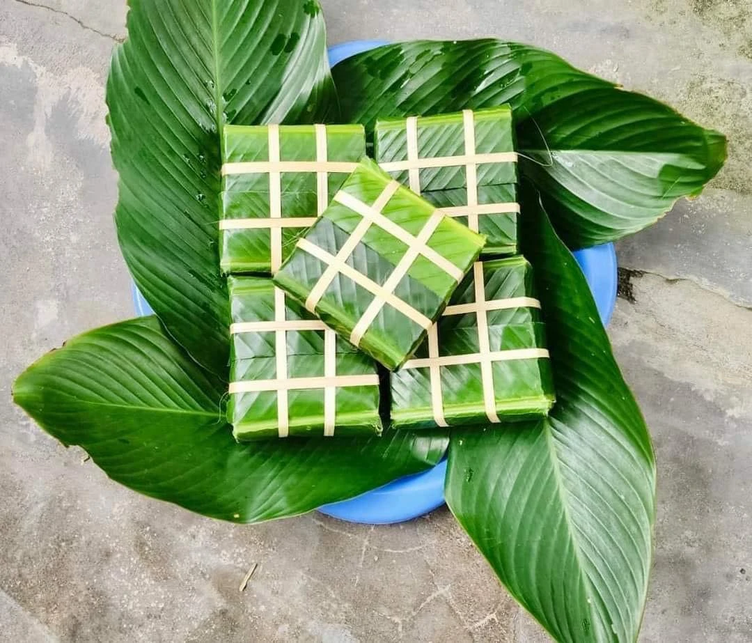 Quây quần gói bánh chưng xanh, giữ trọn dư vị ấm áp ngày Tết cổ truyền